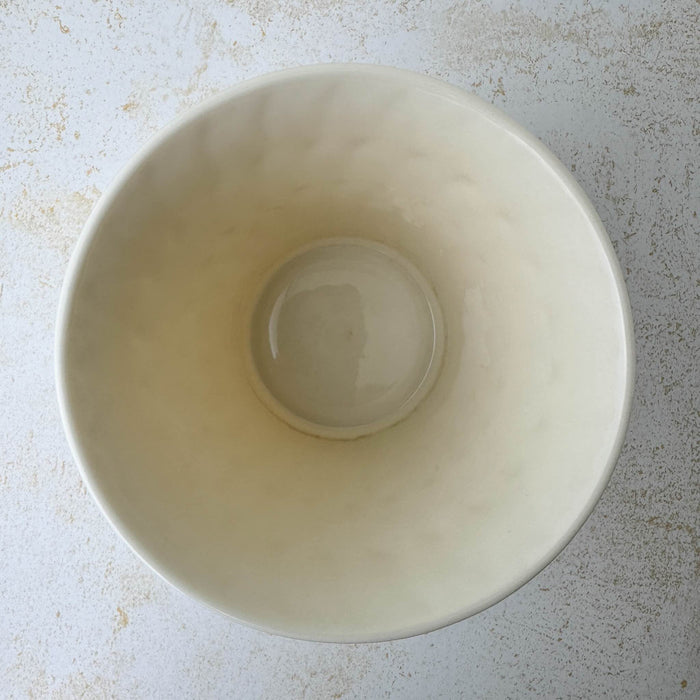 Top down view showing opening and interior of Lenox cachepot with embossed leaf design