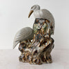Back view of vintage crane figural spill vase showing bark-textured tree trunk base with leaf detail and rich majolica-style glaze