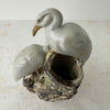 Overhead view of vintage crane figural spill vase showing hollow trunk opening and two white cranes from above