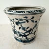 Three-quarter view of Asian-style blue and gray ceramic cachepot