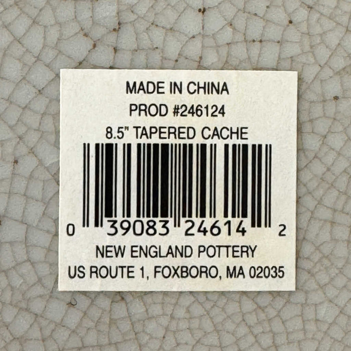 Close-up of label on Asian-style blue and gray ceramic cachepot