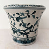 Side view of Asian-style blue and gray ceramic cachepot