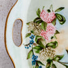 Close-up of left side handle and floral decoration on bavaria porcelain dish