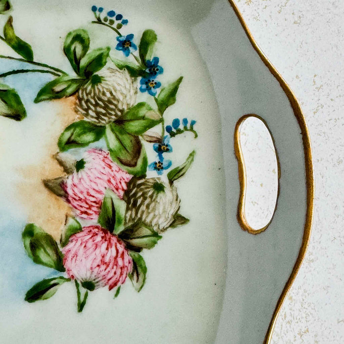 Close-up of right side handle and floral decoration on bavaria porcelain dish