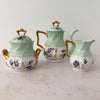 Back view of Jean Pouyat Limoges violets tea set