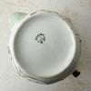 Bottom view of Jean Pouyat Limoges violets teapot