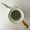 Top down view of Jean Pouyat Limoges violets teapot opening and interior