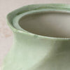 Close-up of small glazed rim manufacturing irregularity on sugar bowl rim