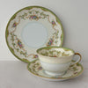 Noritake Marlene Green side plate standing behind matching teacup and saucer