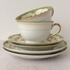 Side view of stacked Noritake Marlene Green tea trios 