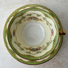 Top down view Noritake Marlene Green teacup stacked on matching saucer