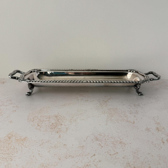 Side view of vintage silverplate rectangular serving tray