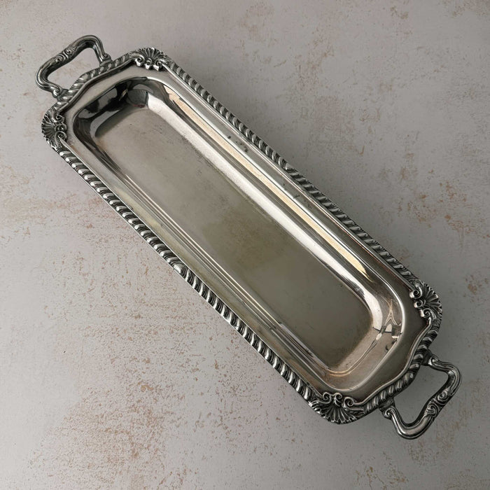 Top down view of vintage silverplate rectangular serving tray
