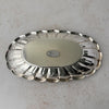 Bottom of vintage Towle silverplate oval bread tray with scalloped rim