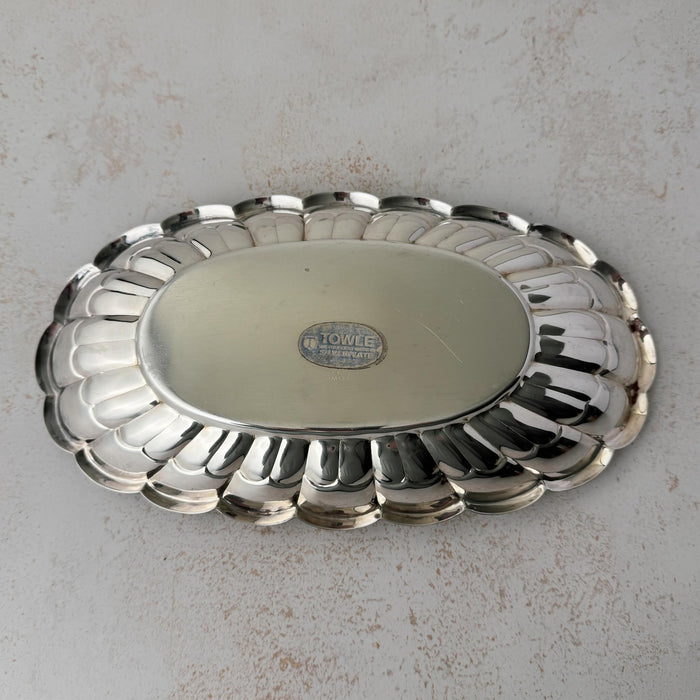Bottom of vintage Towle silverplate oval bread tray with scalloped rim