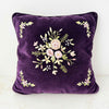 Front view of purple velvet floral ribbon accent pillow