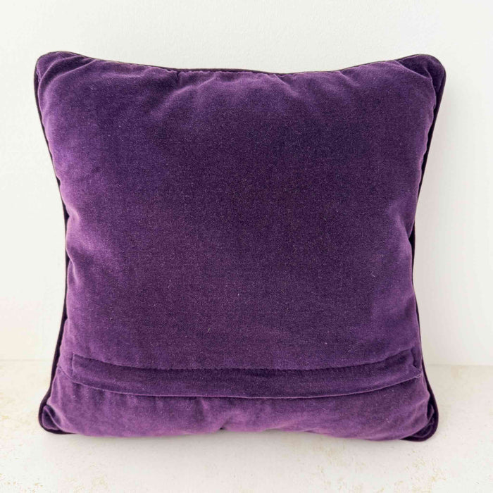 Back view of purple velvet floral ribbon accent pillow
