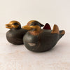 Facing left view of pair of Japanese mandarin duck incense boxes