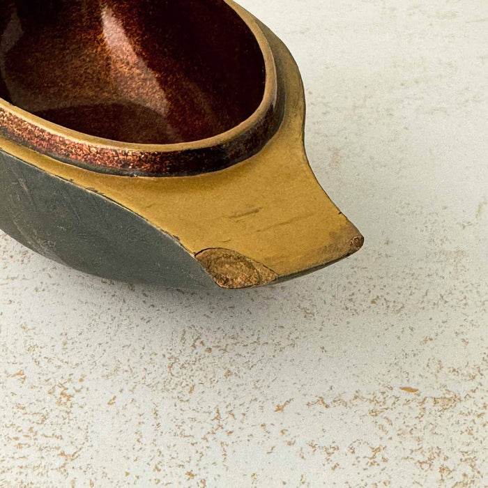 Close-up of chipped tail on male Japanese mandarin duck incense box