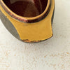 Close-up of chipped tail on female Japanese mandarin duck incense box