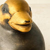 Close-up of black paint loss marks on bill of female Japanese mandarin duck incense box
