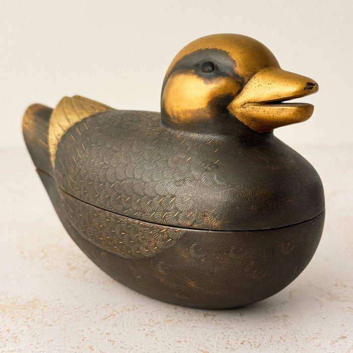 Facing right view of female Japanese mandarin duck incense box