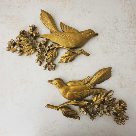 Front view of pair of 1967 Dart Industries bird and apple blossom wall plaques