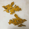 Back view of pair of 1967 Dart Industries bird and apple blossom wall plaques