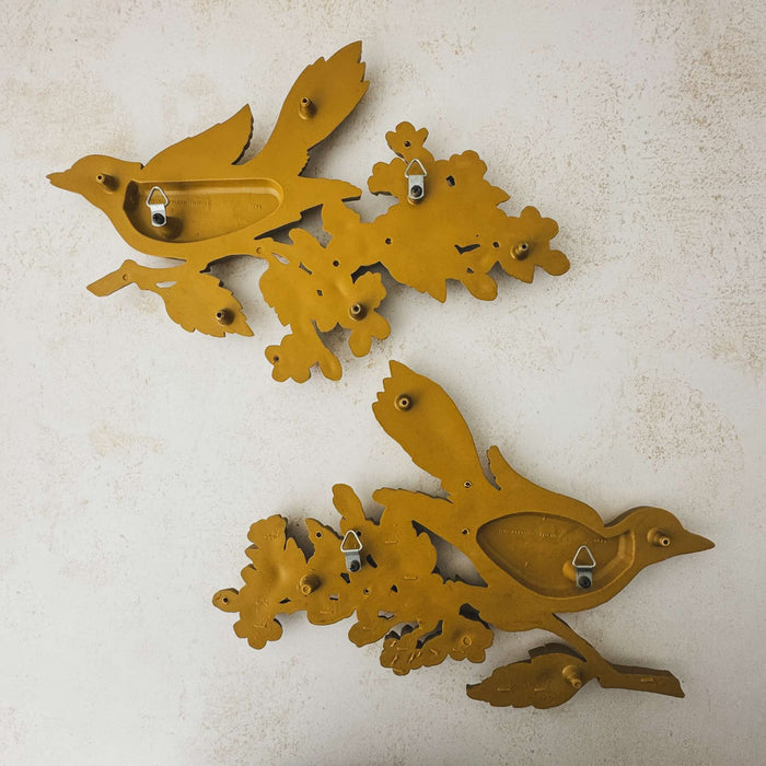 Back view of pair of 1967 Dart Industries bird and apple blossom wall plaques