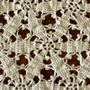 Detailed overhead view of the crochet runner showing the repeating joined floral motifs and small looped accents.