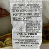 Original pillow insert label identifying 100% polyester fiber fill and Made in U.S.A.