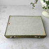 Top down view of paper underside of vintage Chinese calligraphy presentation box on a light surface