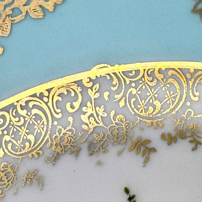 Close-up of the gray and gold inner border, including a small original gold curl extending onto the turquoise rim.