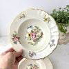 Pair of vintage Syracuse China Portland rimmed soup bowls with multicolored floral bouquets, scalloped ivory rims, and gold trim.