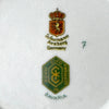 Close-up of Schumann Arzberg Germany and CICO Made in Germany Bavaria marks on the underside of the porcelain dish.