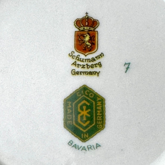 Close-up of Schumann Arzberg Germany and CICO Made in Germany Bavaria marks on the underside of the porcelain dish.