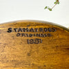 Close-up of wood-burned underside mark reading “Stamatedes Originals 1981.”