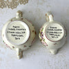 Undersides of sugar bowl and creamer showing Porta, Hand-Painted, Lynn-Hollyn, Portugal markings and identifying numbers.