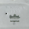 Close-up of the underside markings showing the impressed Th. Kärner signature, model number 1547, and Rosenthal Germany handgemalt backstamp.