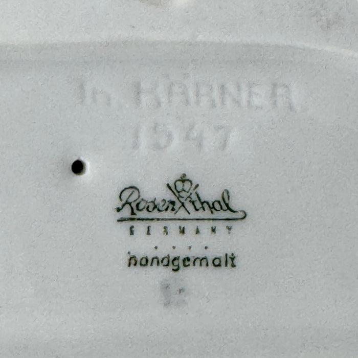 Close-up of the underside markings showing the impressed Th. Kärner signature, model number 1547, and Rosenthal Germany handgemalt backstamp.