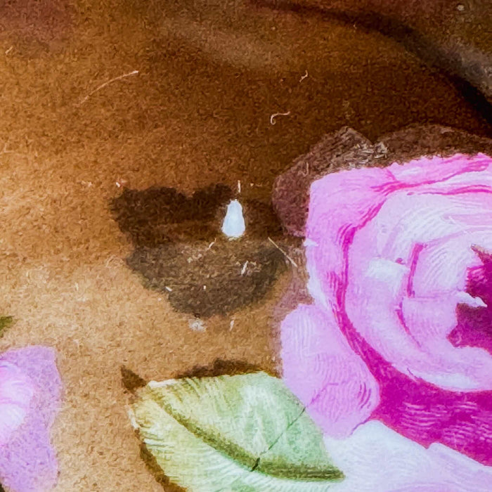 Close-up of shallow chip on small antique Carl Tielsch pink rose bowl 