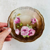 Small antique Carl Tielsch pink rose bowl with hand for scale
