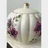 Vintage Gibsons Staffordshire England teapot in a styled setting, shown from the front, spout side, overhead, and handle side.