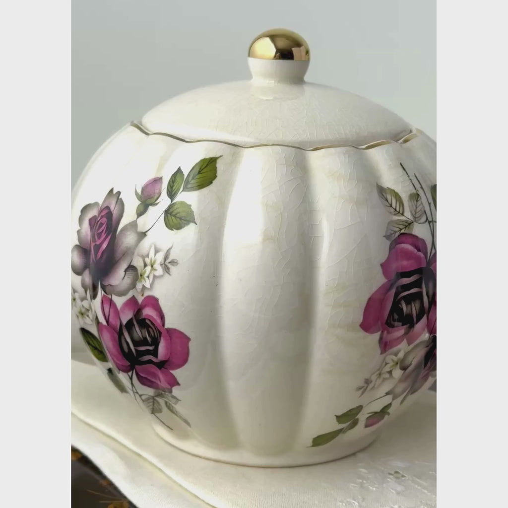 Vintage Gibsons Staffordshire England teapot in a styled setting, shown from the front, spout side, overhead, and handle side.
