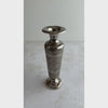 Short video of engraved bud vase turned to show underside of base, into neck, and rotated to show all sides