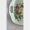 Short panning video of hand-painted PM Bavaria tray in natural light, showing glaze and painted details