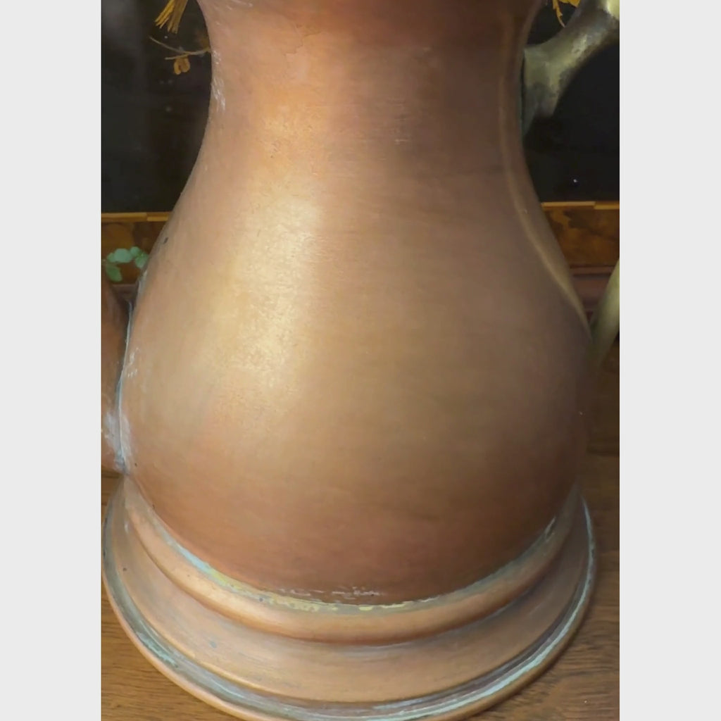 Vintage copper kettle in a styled setting, shown from the front, spout side, overhead, and handle side.