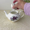 Vintage Royal Grafton teapot demonstrated by locking the lid in place and lifting the teapot into a pouring position