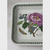 Vintage Portmeirion Botanic Garden rectangular baking dish, interior showing pink peony, butterflies, and green leaf border